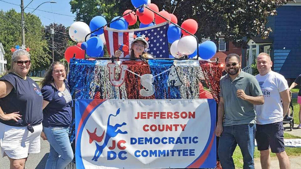 Color photo of Jefferson County Democratic Committee members and candidates participating in the Carthage Patriotic Parade on July 11, 2026